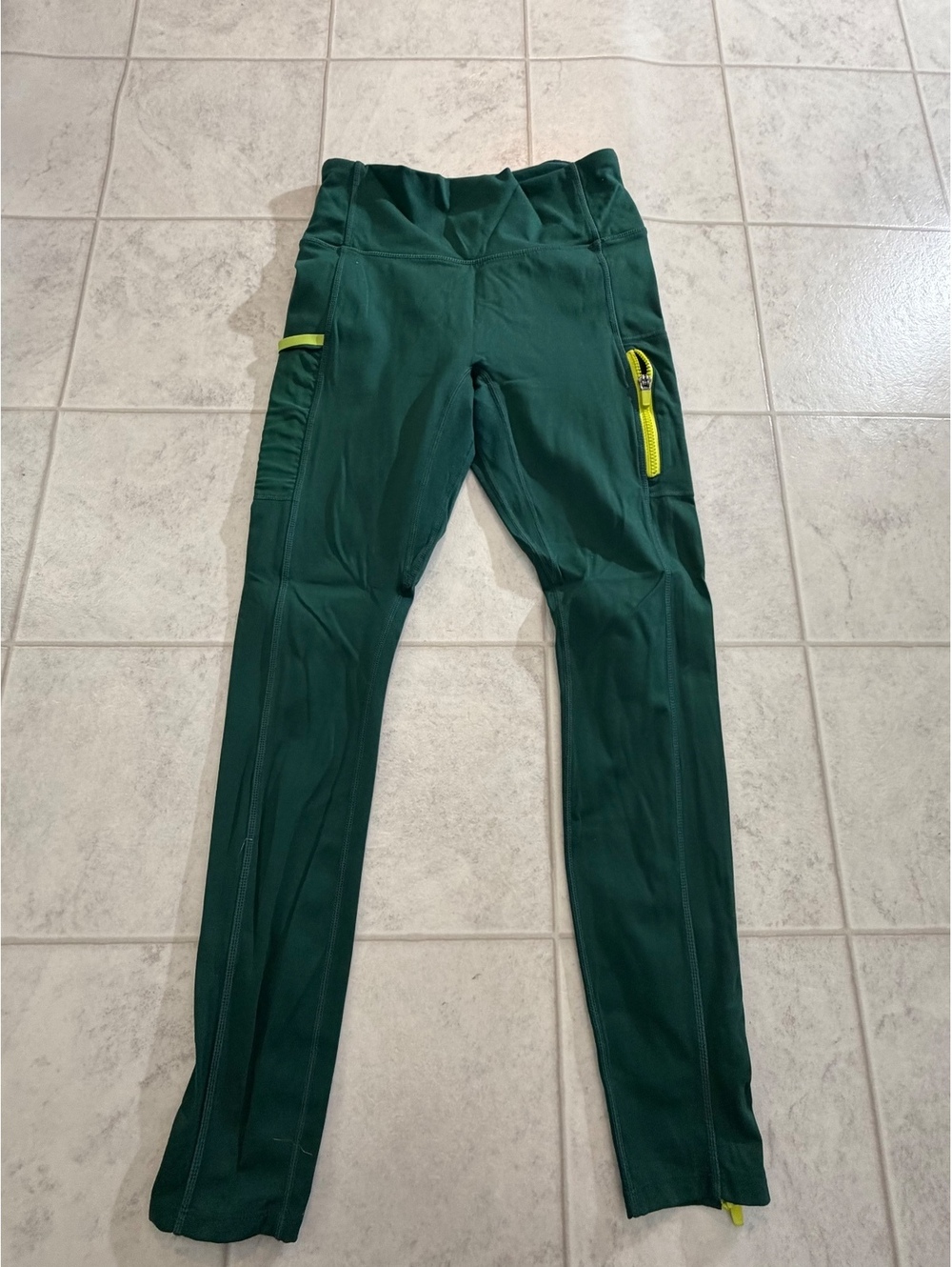 Fabletics Motion365 Green Leggings with Yellow Zip Details